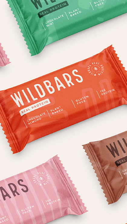 Colorful assortment of plant-based Wildbars protein bars