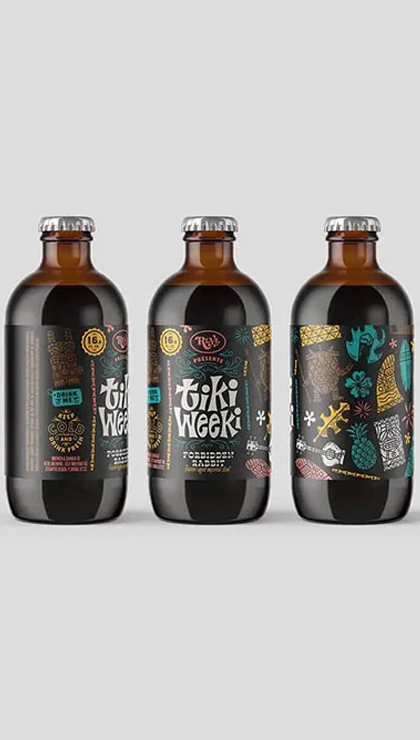 Three glass bottles with Tiki Weeki labels